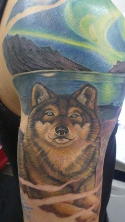 Tattoos - detail of a artic wolf in a northern lights scene - 48945